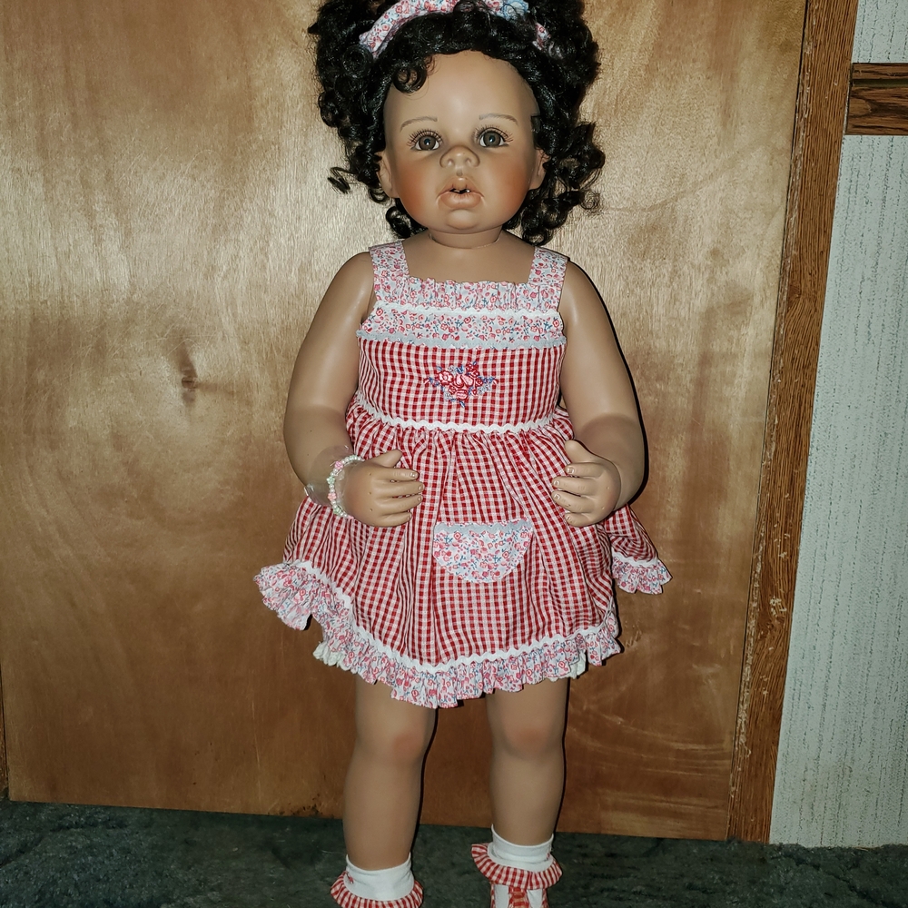 Charming Checkered Doll in Red Dress